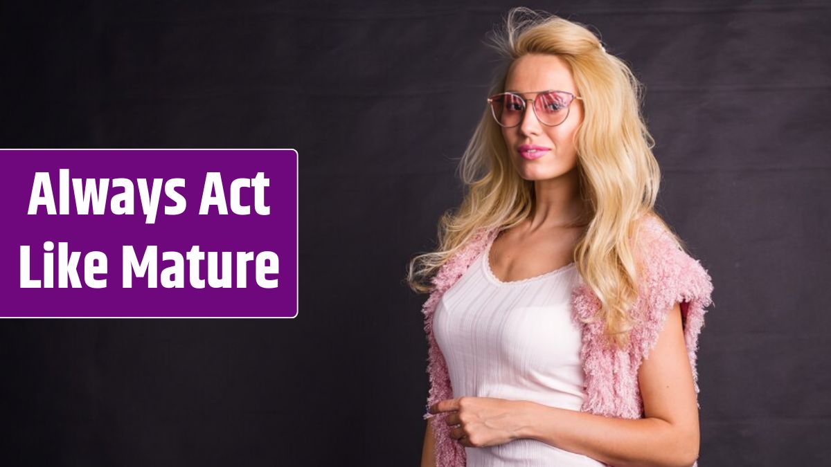 Fashion and beauty concept portrait of blond model dressed in white shirt and pink cardigan over.