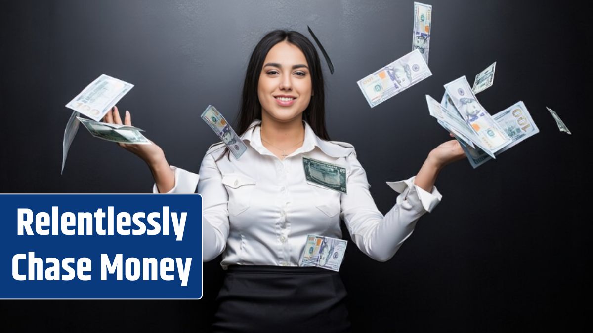 Happy business woman under a money rain made of dollars isolated on black wall.