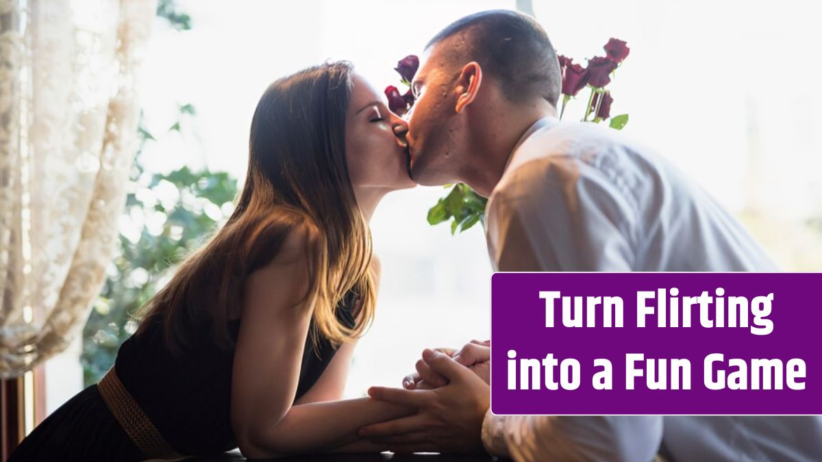 Man kissing attractive woman near flowers and window.