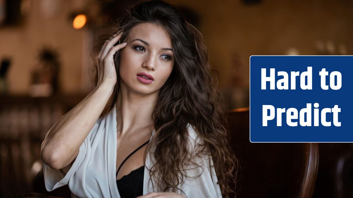 Portrait of beautiful woman sitting in restaurant.