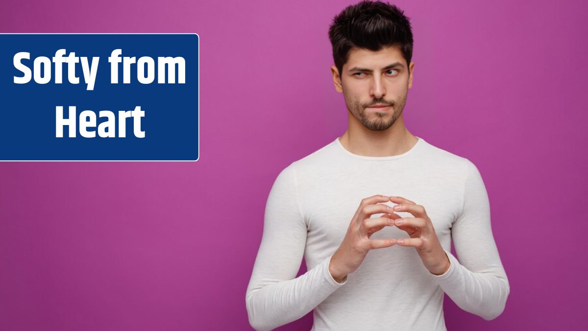 Sly young handsome man looking at side planning something evil on purple background with copy space.