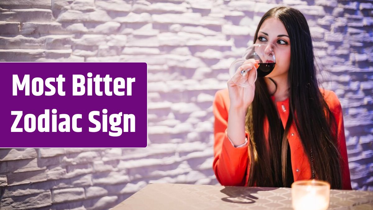 Woman drinking wine in restaurant.