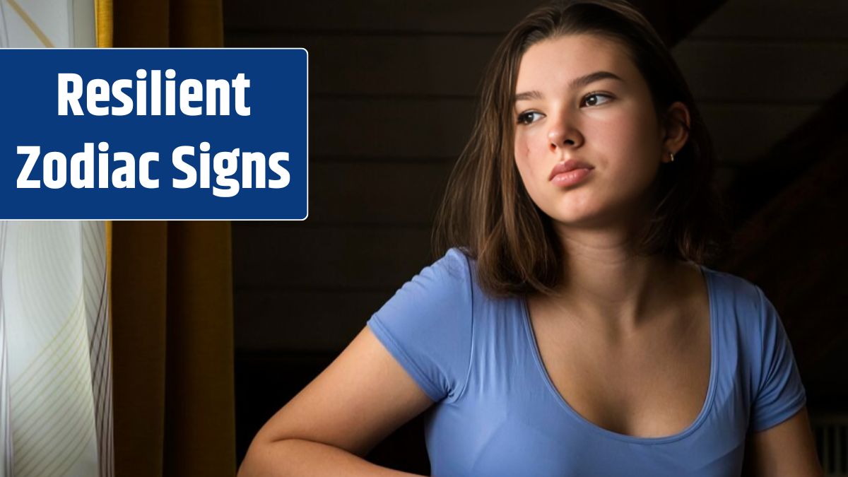 Girl looking away while sitting on chair at home.